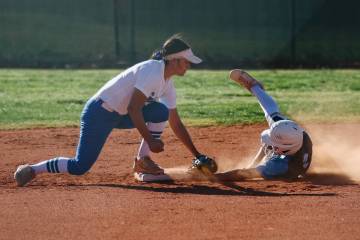 Green Valley second base Liliana Esparza (8) puts out Centennial runner Lacy Mayes (7) during t ...