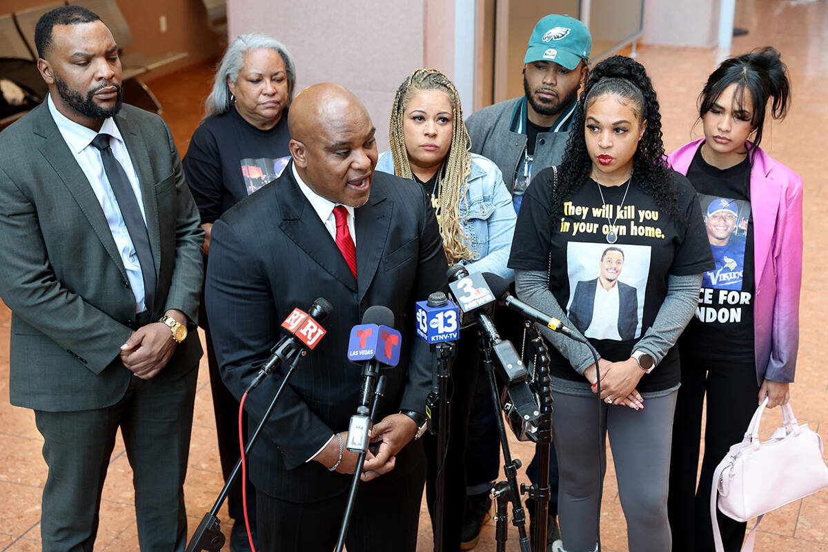 Family members of Brandon Durham, who was shot and killed by police after reporting a home inva ...