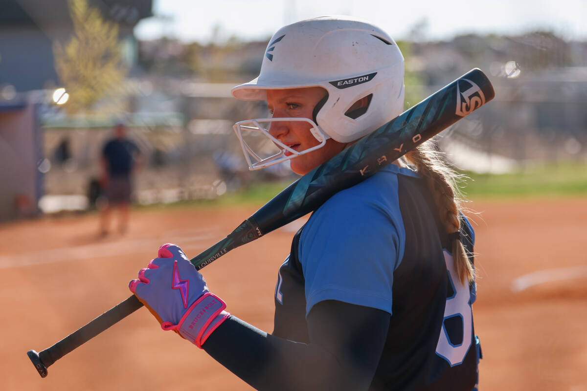 Centennial’s Sloane Merrell (8) stands at bat during the softball game against Green Val ...