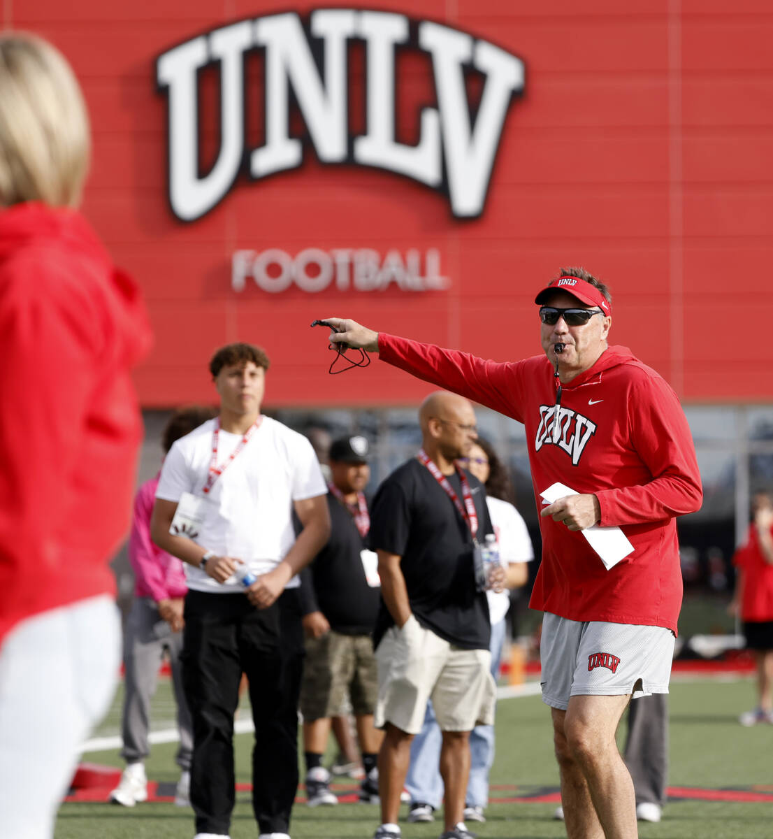 UNLV football head coach Dan Mullen whistles to signal the start of team practice, on Thursday, ...