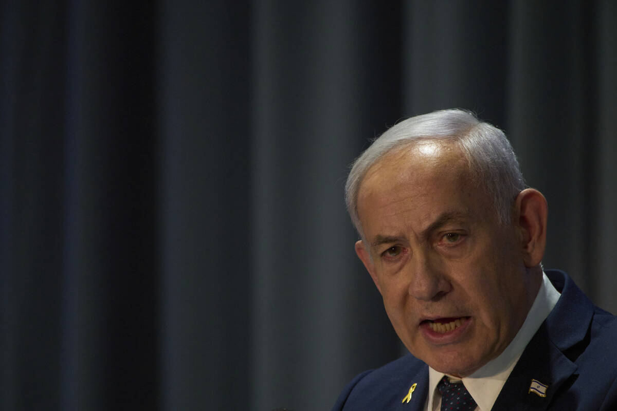 Israel's Prime Minister Benjamin Netanyahu delivers a speech during the International Conferenc ...