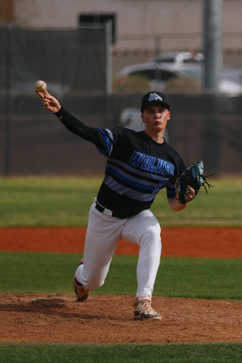 Basic Academy pitcher Lincoln Evans (21) releases the ball against Liberty during the baseball ...
