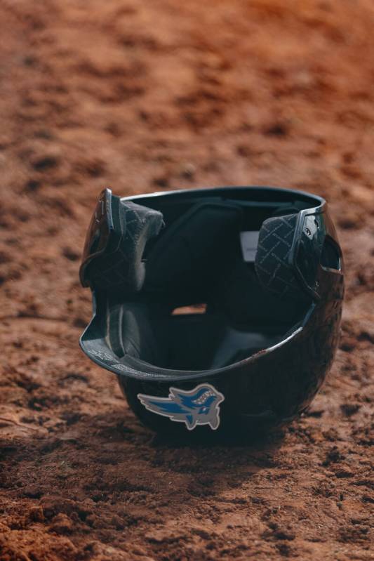 A Basic Academy helmet lies on the ground as the Wolves take the field to pitch against Liberty ...