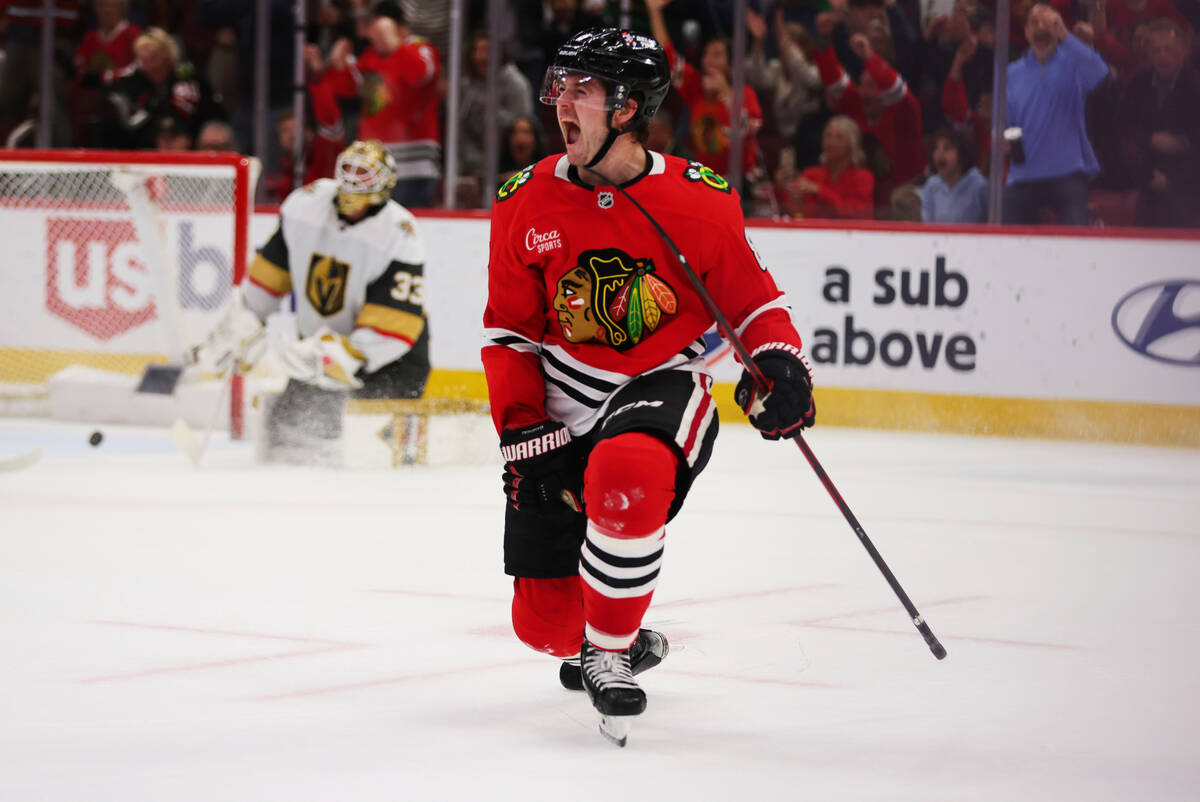 Chicago Blackhawks center Ryan Donato (8) celebrates in the second period after scoring his thi ...