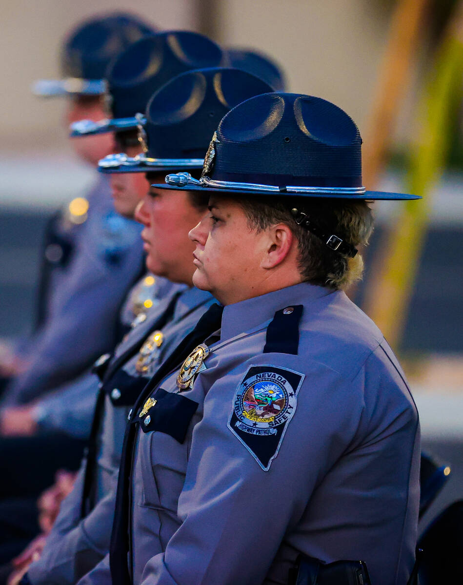 Troopers attend a vigil hosted by the Nevada Highway Patrol to honor traffic accident victims a ...