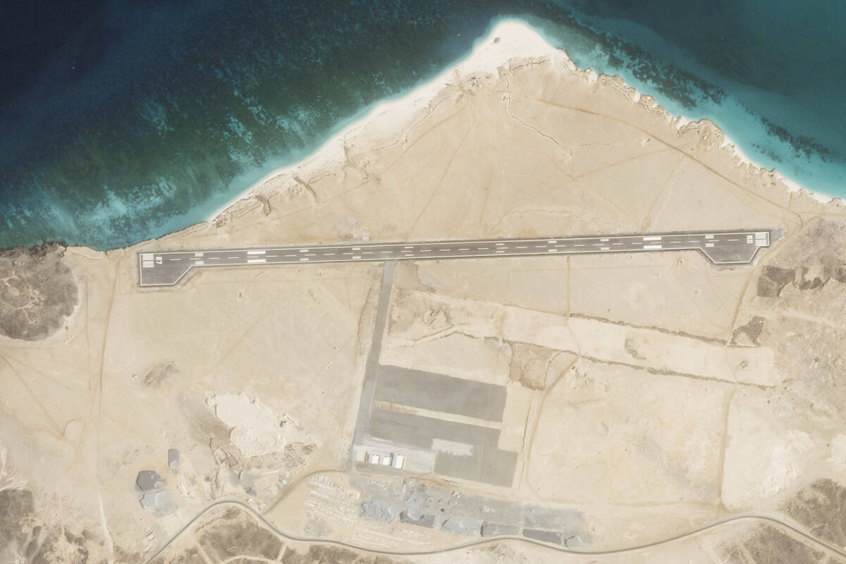 This satellite photo from Planet Labs PBC shows an airstrip on Mayun Island, also known as Peri ...