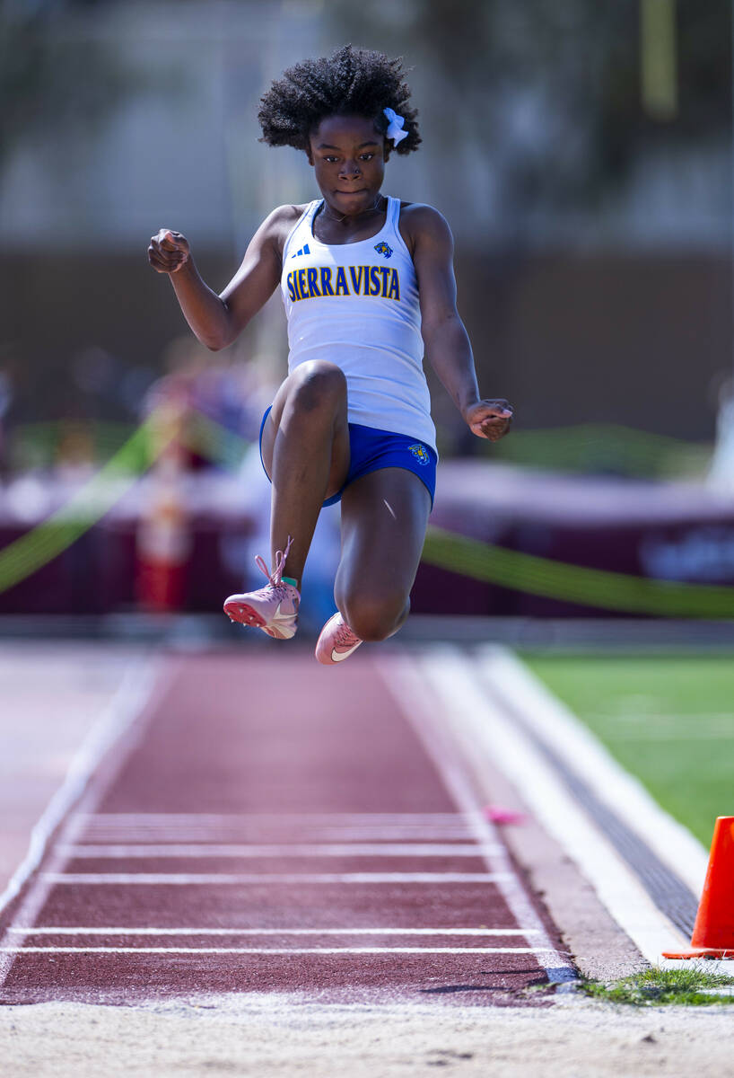 A Sierra Vista jumper looks for her landing in the varsity girls long jump during the 2025 Las ...