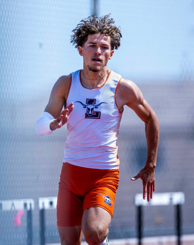 Legacy's Sylus West-Gaither turns the corner on his way to a winning and new state time in the ...