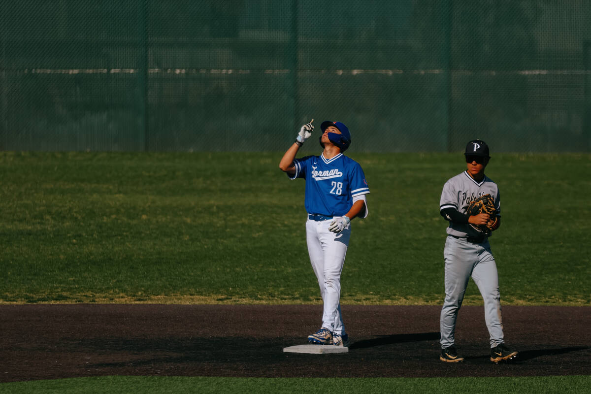 Bishop Gorman’s Chase Wilk (28) celebrates hitting a double during the baseball game aga ...