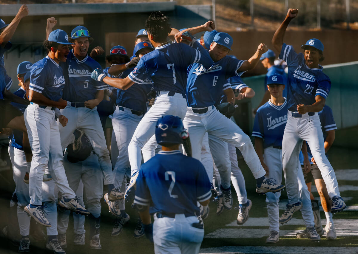 The Gaels celebrate teammate Justin Rodrigues (7) home run against Plao Verde during the baseba ...