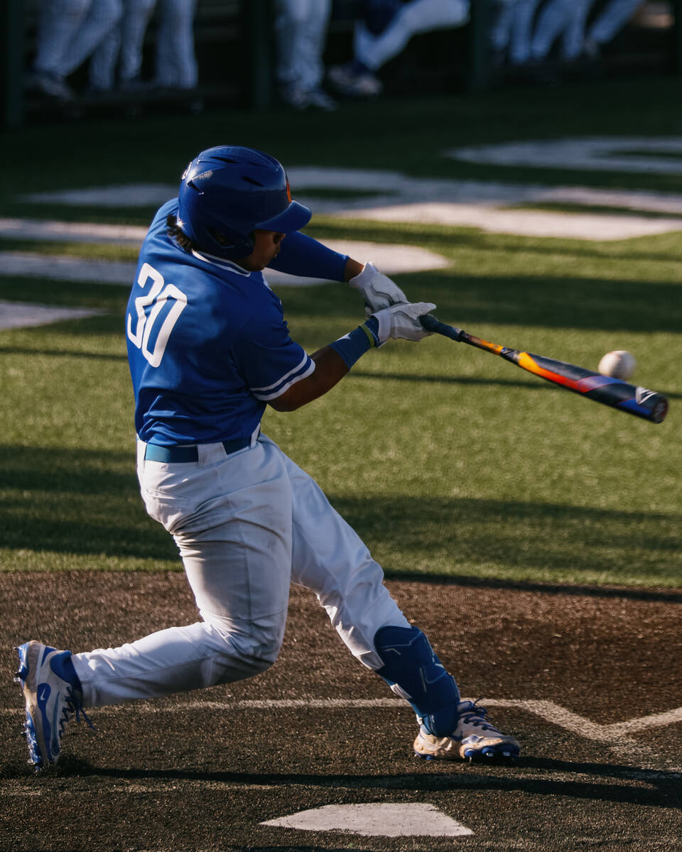 Bishop Gorman hitter Koa Young (30) takes a swing during the baseball game against Palo Verde o ...