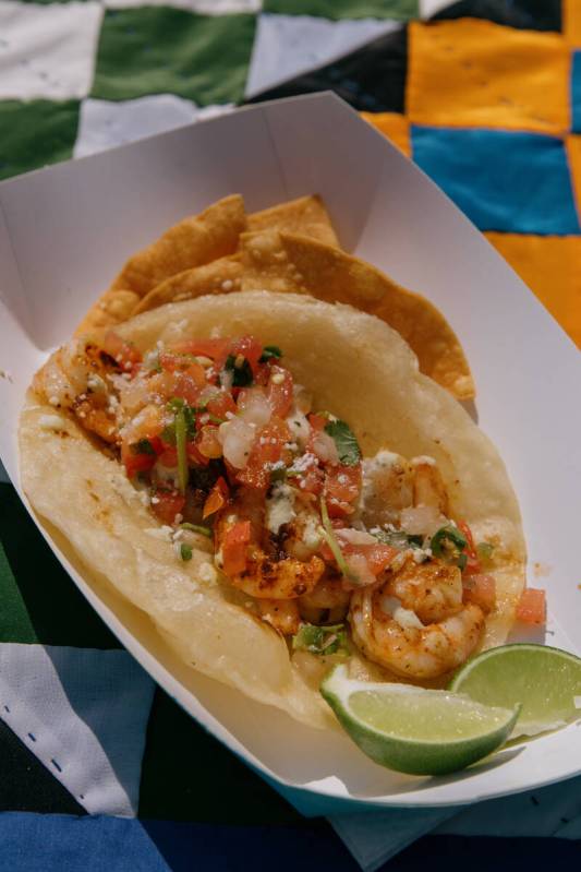 A shrimp puffy taco, served at Shawn’s Puffy Taco food truck during the Tacos and Tamale ...