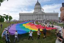 FILE - People march following a Pride rally at the Utah State Capitol Friday, June 2, 2023, in ...