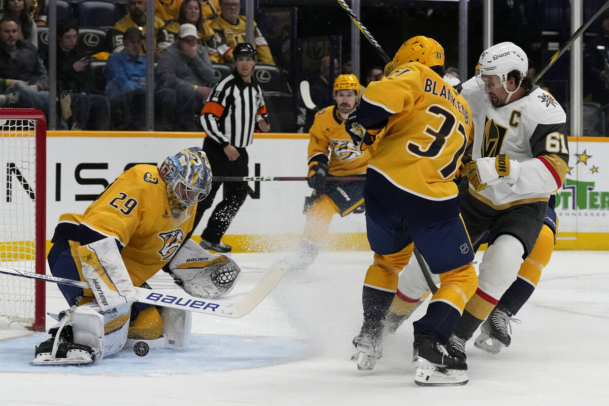 Vegas Golden Knights right wing Mark Stone (61) and Nashville Predators defenseman Nick Blanken ...