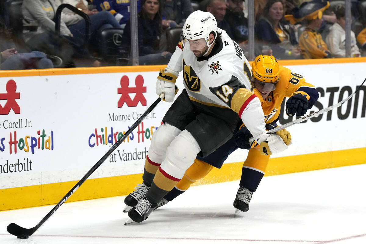 Vegas Golden Knights defenseman Nicolas Hague (14) and Nashville Predators left wing Zachary L' ...