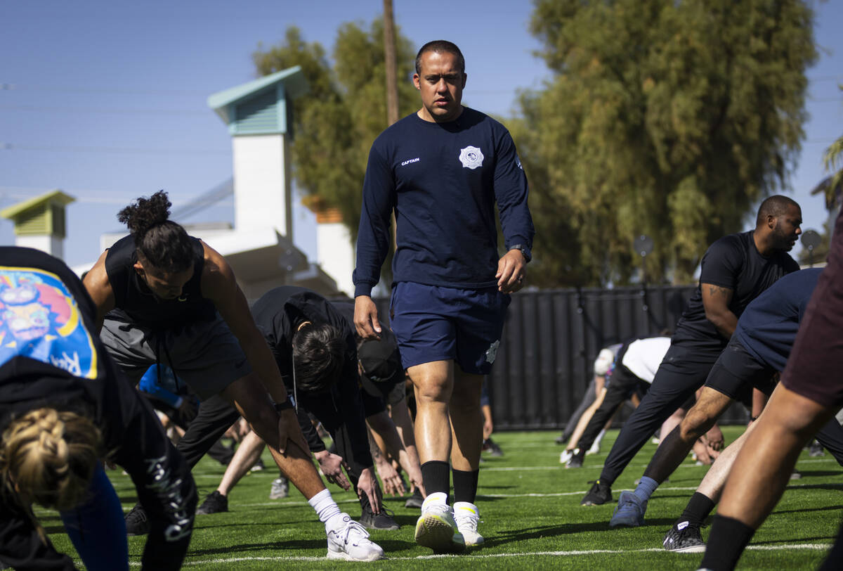 Capt. Nicholas Rhodes leads drills during a community boot camp led by Las Vegas Fire & Res ...