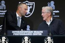 The new Raiders general manager John Spytek, left, and new head coach Pete Carroll shake hands ...