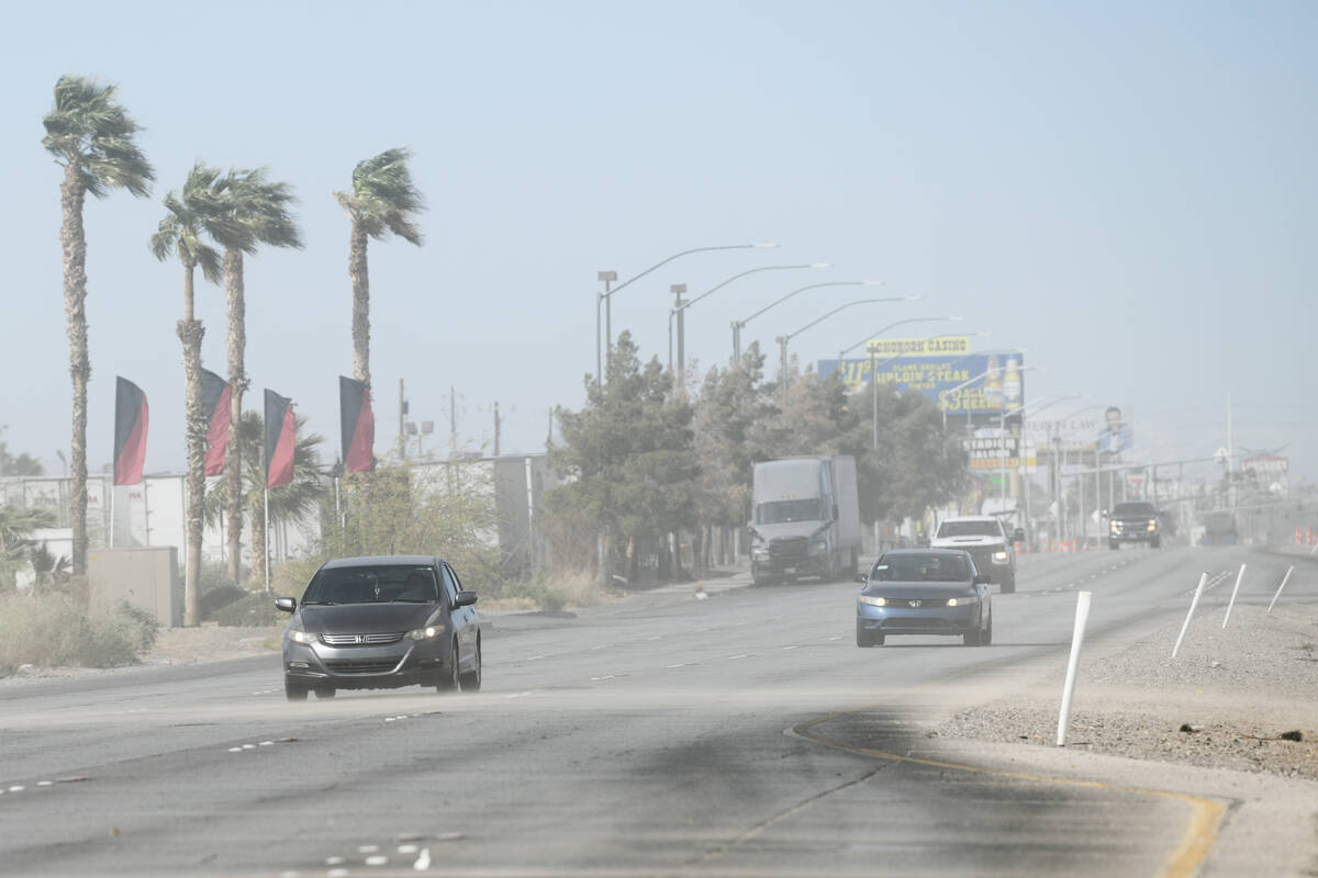 High winds and blowing dust obscure traffic on Boulder Highway near Russell Road Friday, Februa ...
