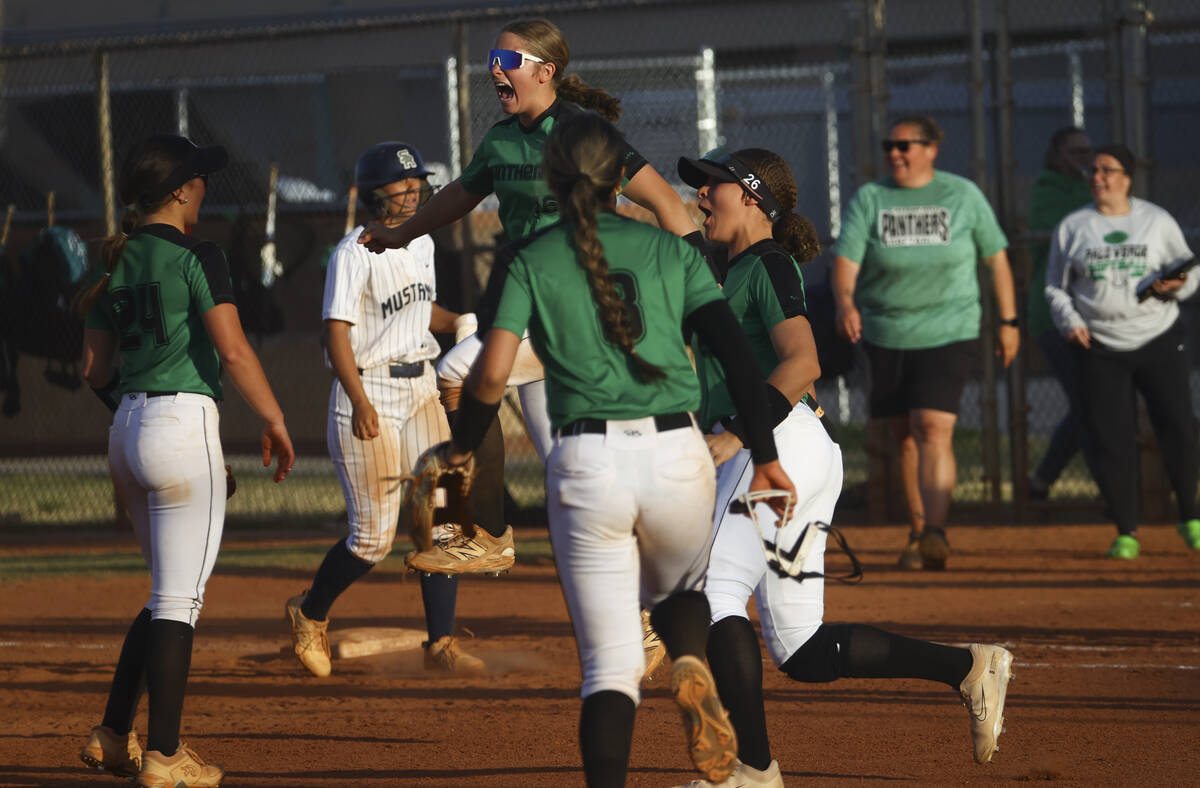 Palo Verde players celebrate after defeating at Shadow Ridge in a softball game at Shadow Ridge ...