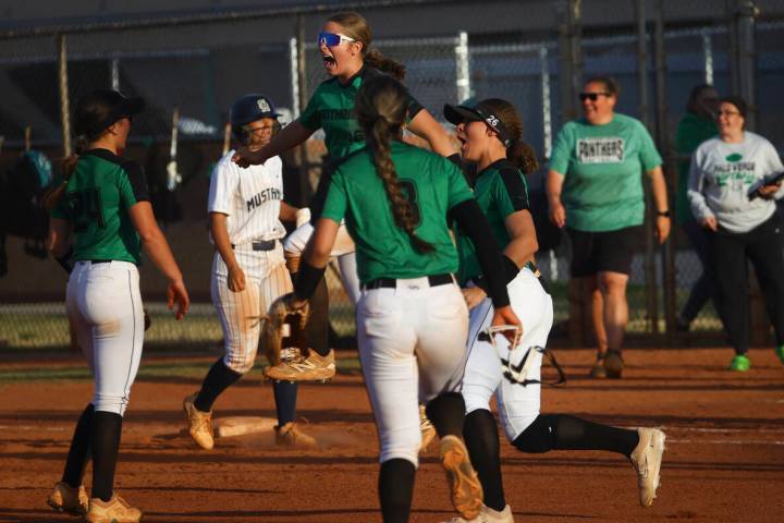 Palo Verde players celebrate after defeating at Shadow Ridge in a softball game at Shadow Ridge ...