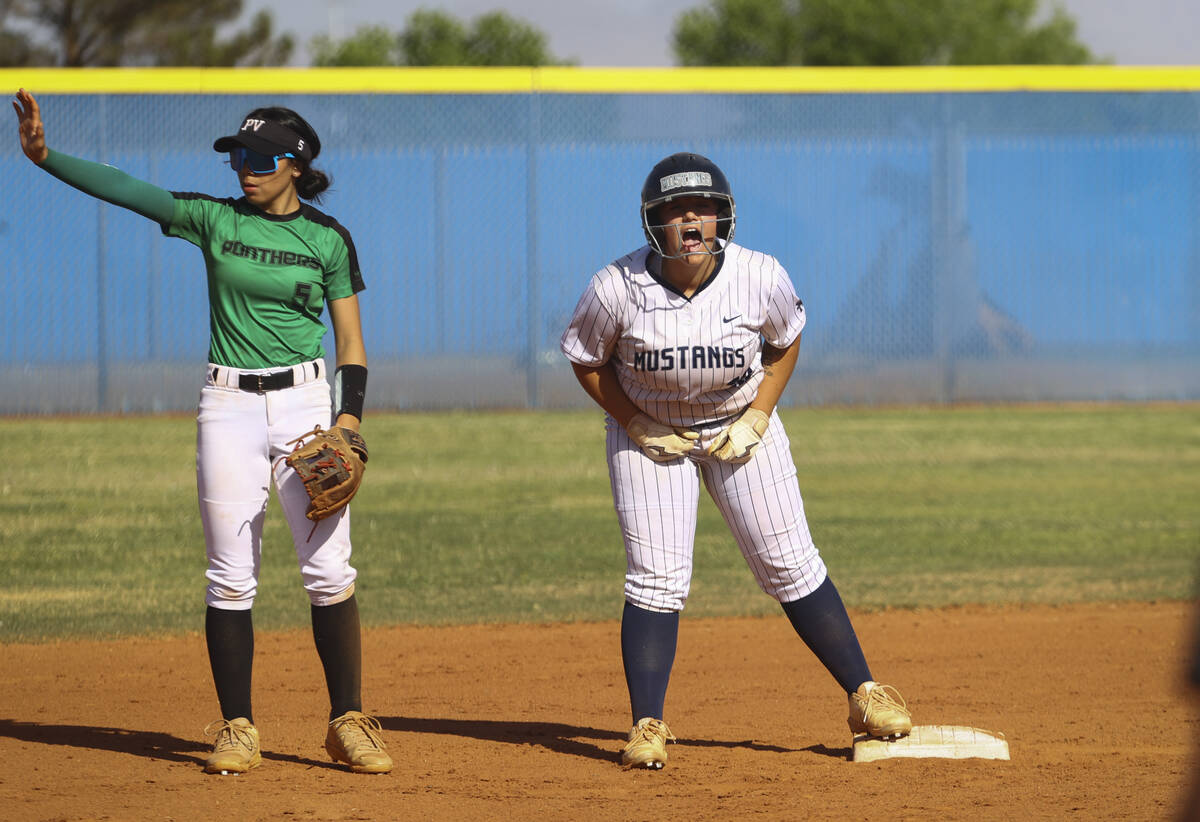 Shadow Ridge's Madison Foster (18) celebrates after hitting a double against Palo Verde during ...