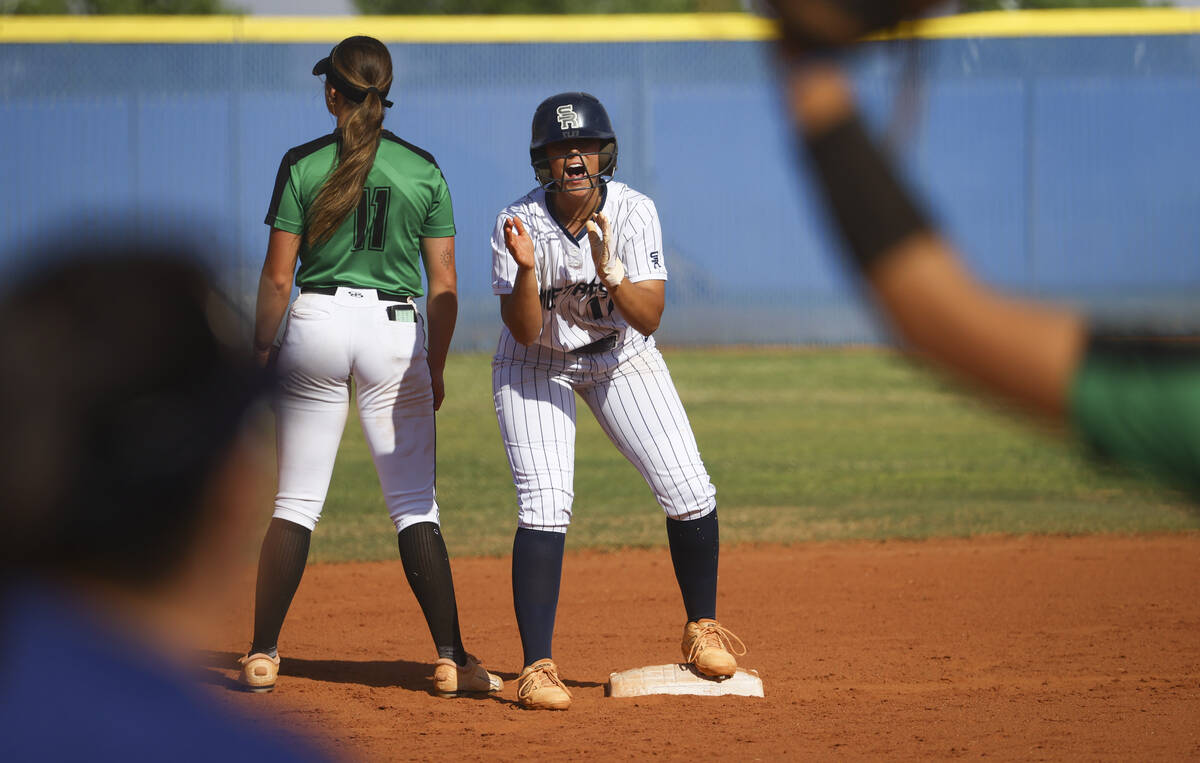 Shadow Ridge's Chloe Covington (17) celebrates after hitting a double against Palo Verde during ...