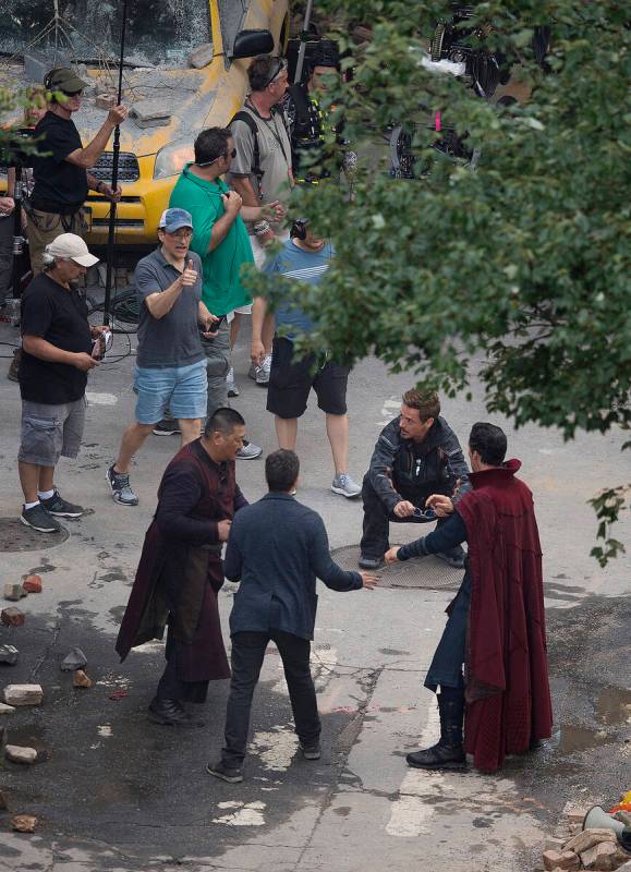 Cast members Mark Ruffalo Robert Downey Jr., Benedict Wong and Benedict Cumberbatch work during ...