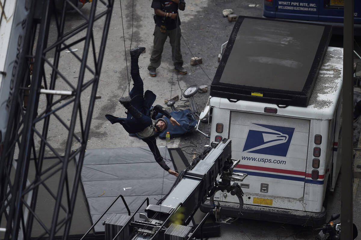 A stunt man in the costume of Doctor Strange works during the filming of "Avengers: Infini ...