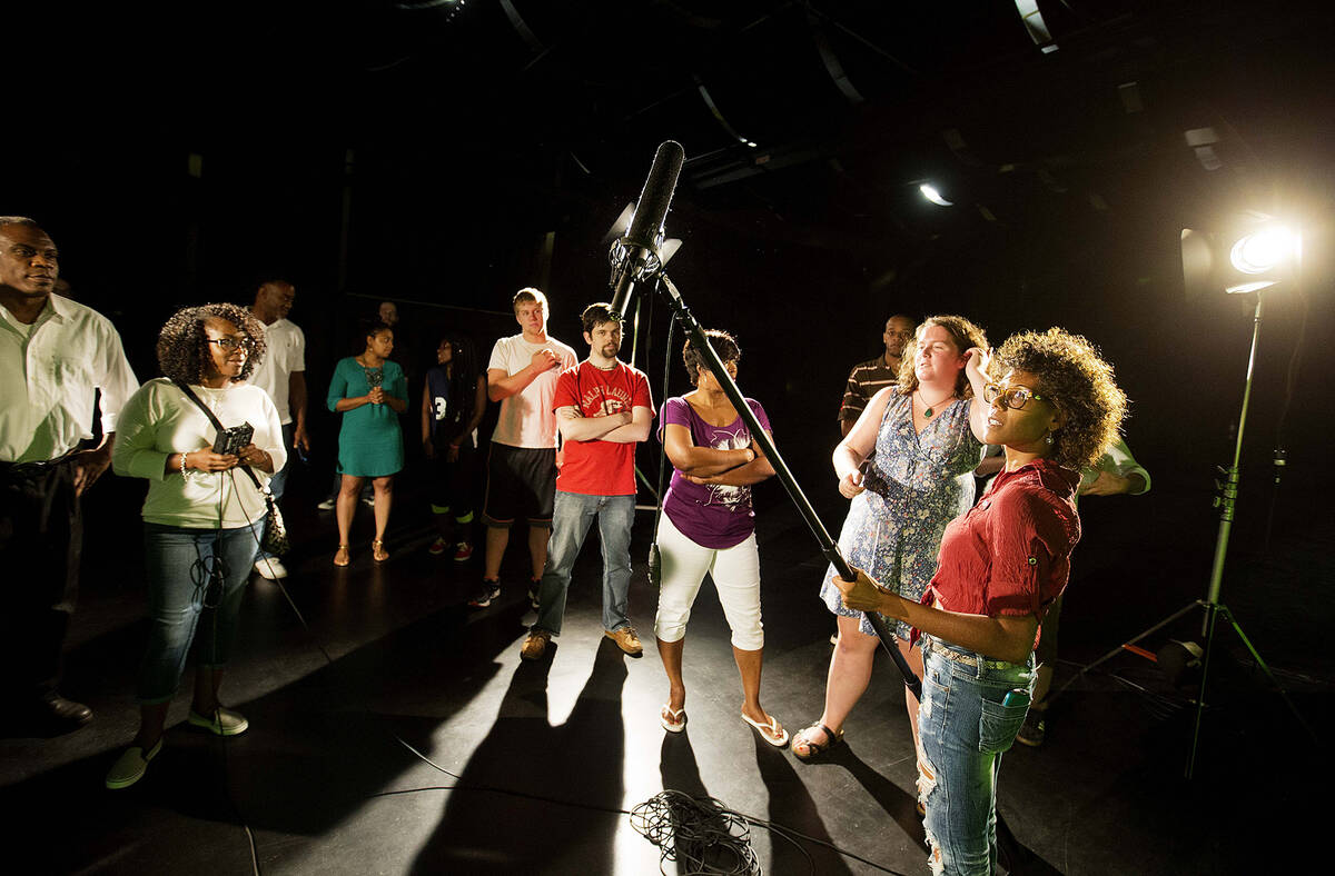 In this Tuesday, July 7, 2015 photo, student Sherelle Briers, of Stockbridge, Ga., holds a boom ...