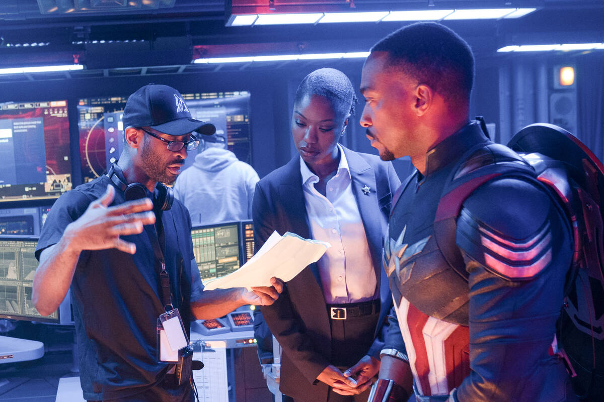 From left, Director Julius Onah, Xosha Roquemore, and Anthony Mackie are seen on the set of Mar ...