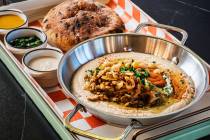 Hummus, spiced chicken and pita for chicken shawarma at Cafe Landwer, the new Israeli and Medit ...