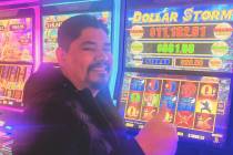 Christian hit the Super Grand Top Award playing the Dollar Storm slot machine for $136,882 on S ...