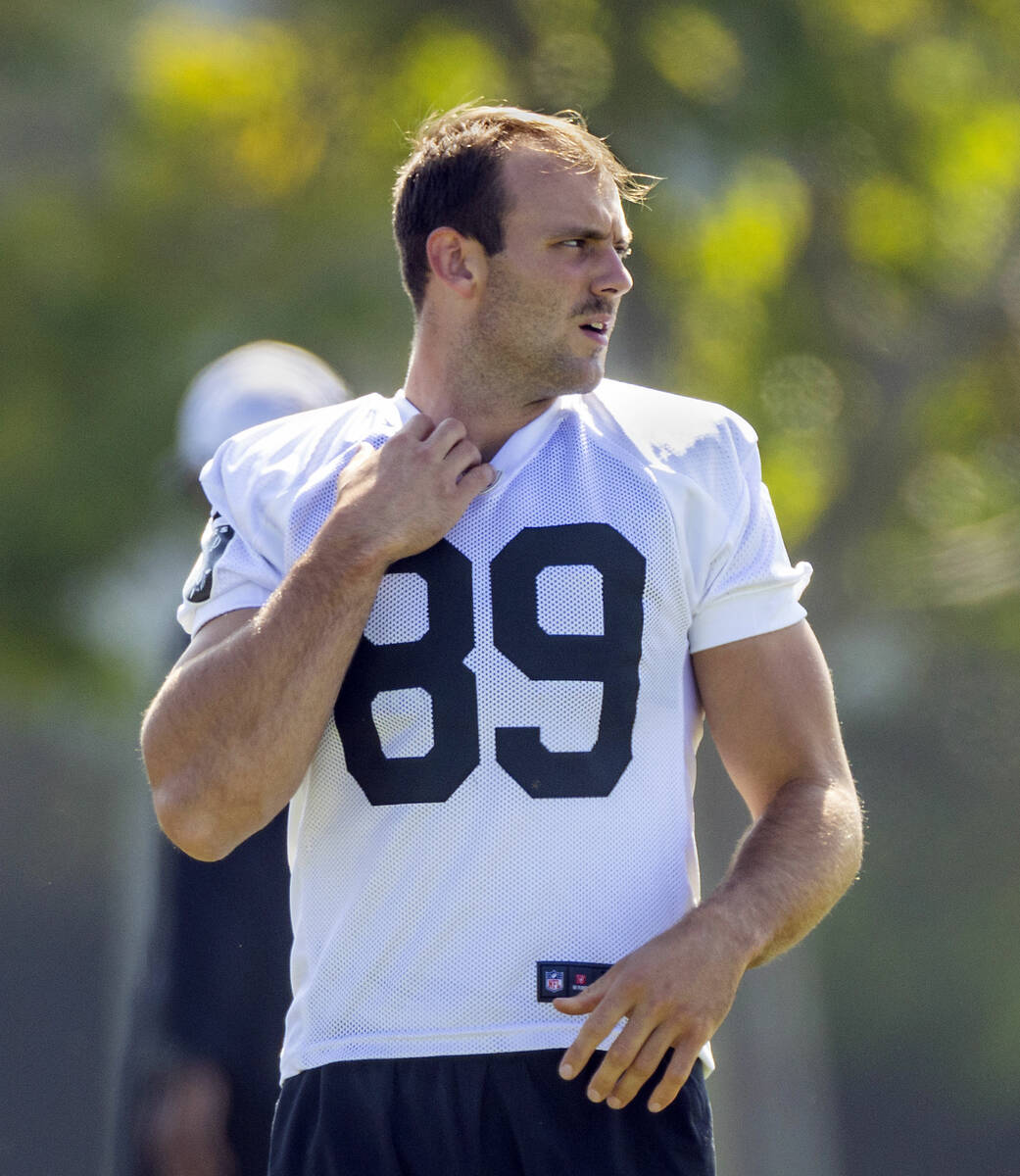 Raiders tight end Brock Bowers (89) looks to a teammate during the third day of Raiders trainin ...
