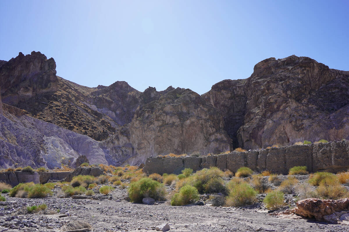 After rock-hopping over the Amargosa River and possibly getting their shoes a little wet, hiker ...