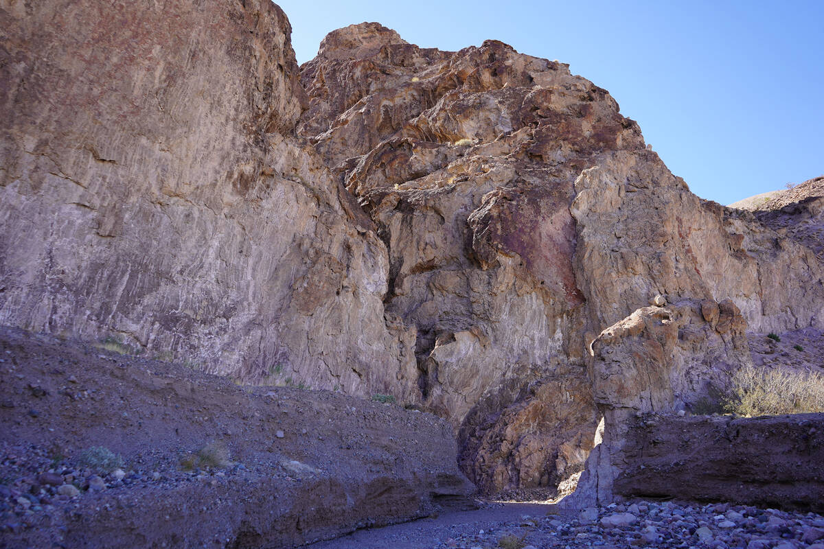 Hikers can add a visit to a nearby slot canyon, which starts at this entrance, after hiking alo ...