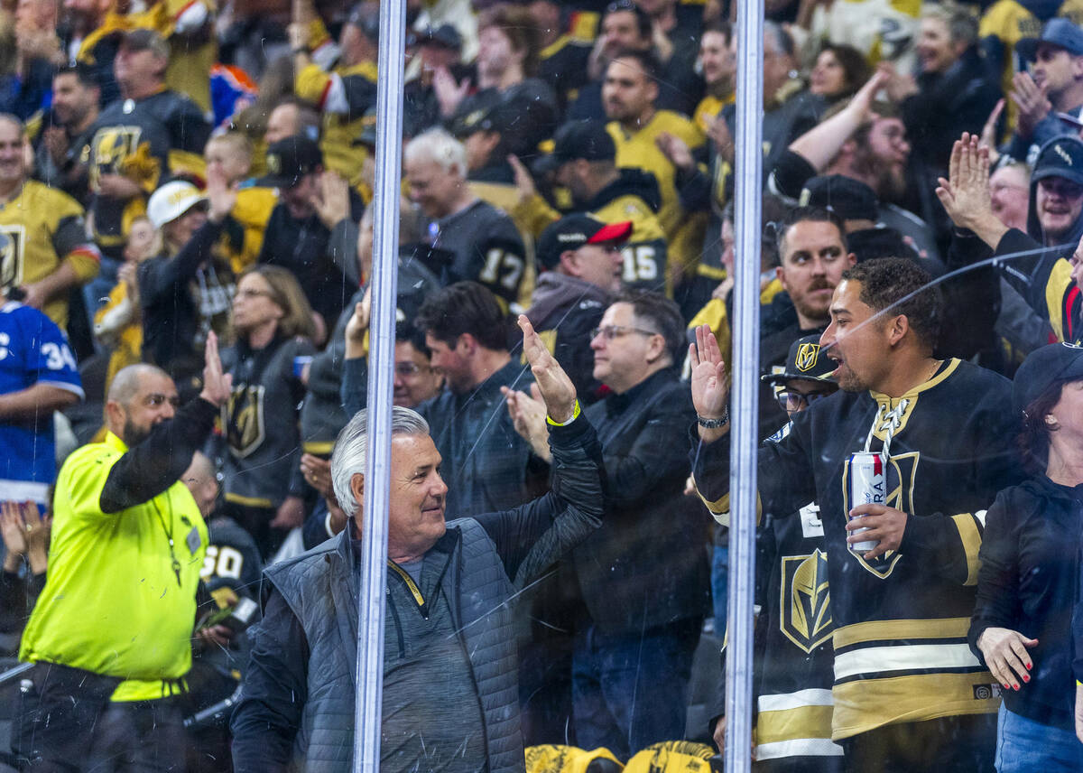 Golden Knights fans celebrate their first goal against the Edmonton Oilers during the first per ...
