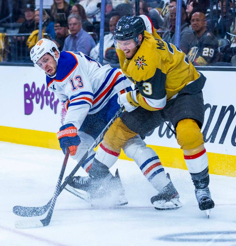 Golden Knights defenseman Brayden McNabb (3) takes the puck from Edmonton Oilers center Mattias ...