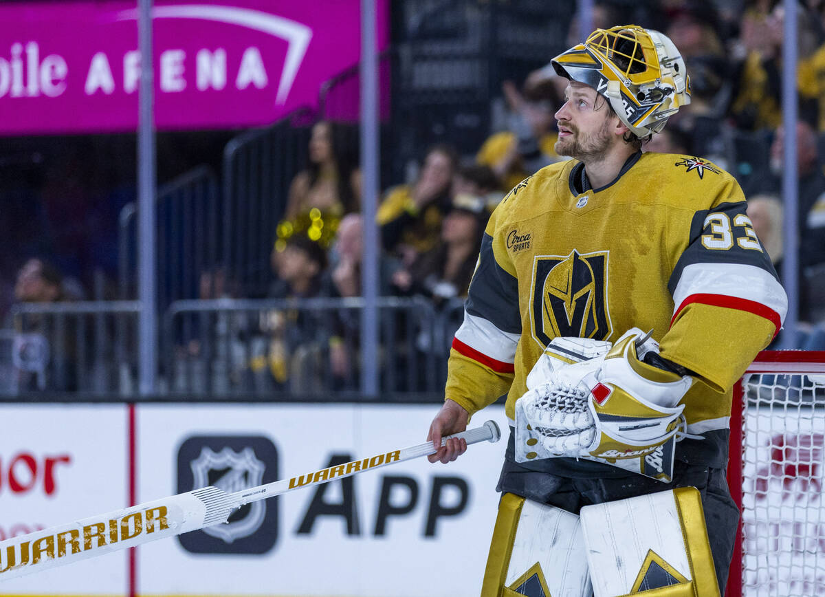 Golden Knights goaltender Adin Hill (33) looks to the replay after scored on by the Edmonton Oi ...
