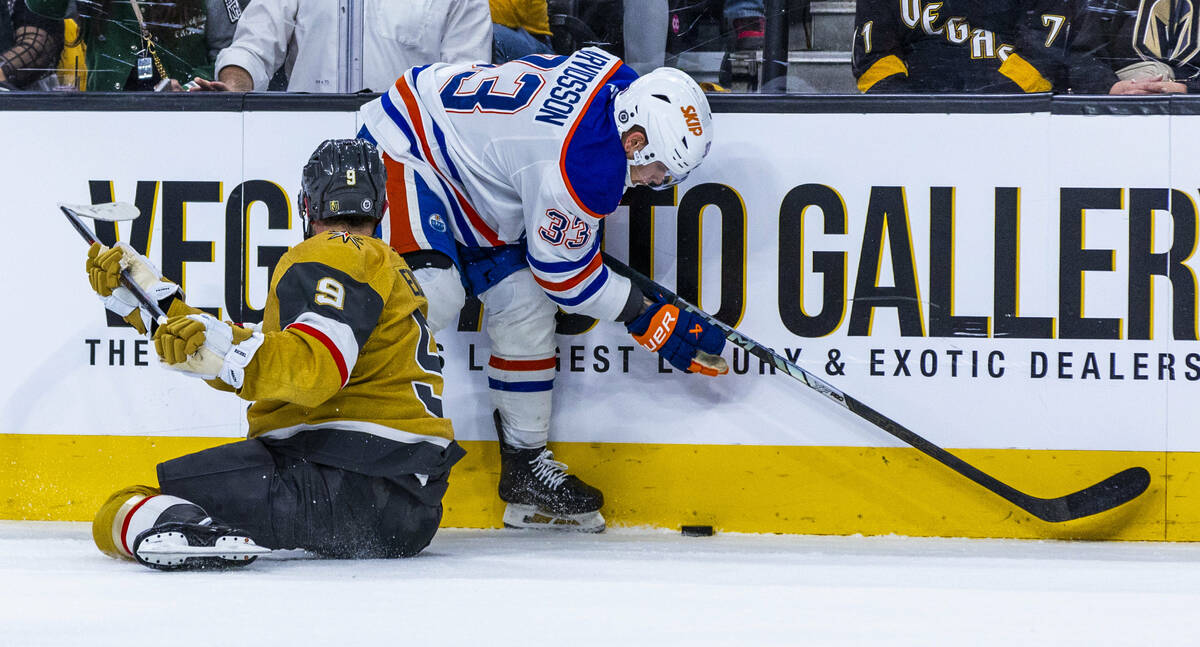 Golden Knights center Jack Eichel (9) goes to the ice to pursue a puck against Edmonton Oilers ...