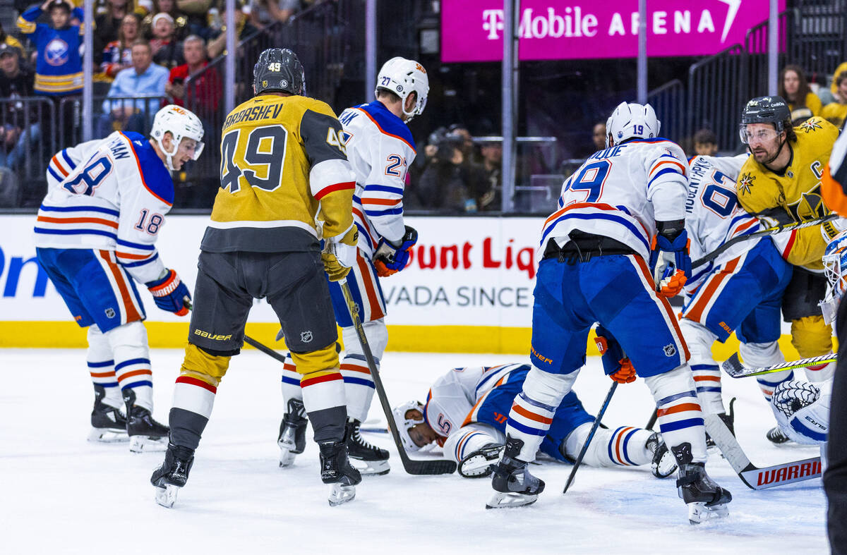 Edmonton Oilers defenseman Darnell Nurse (25) smothers a puck late in the game against the Gold ...