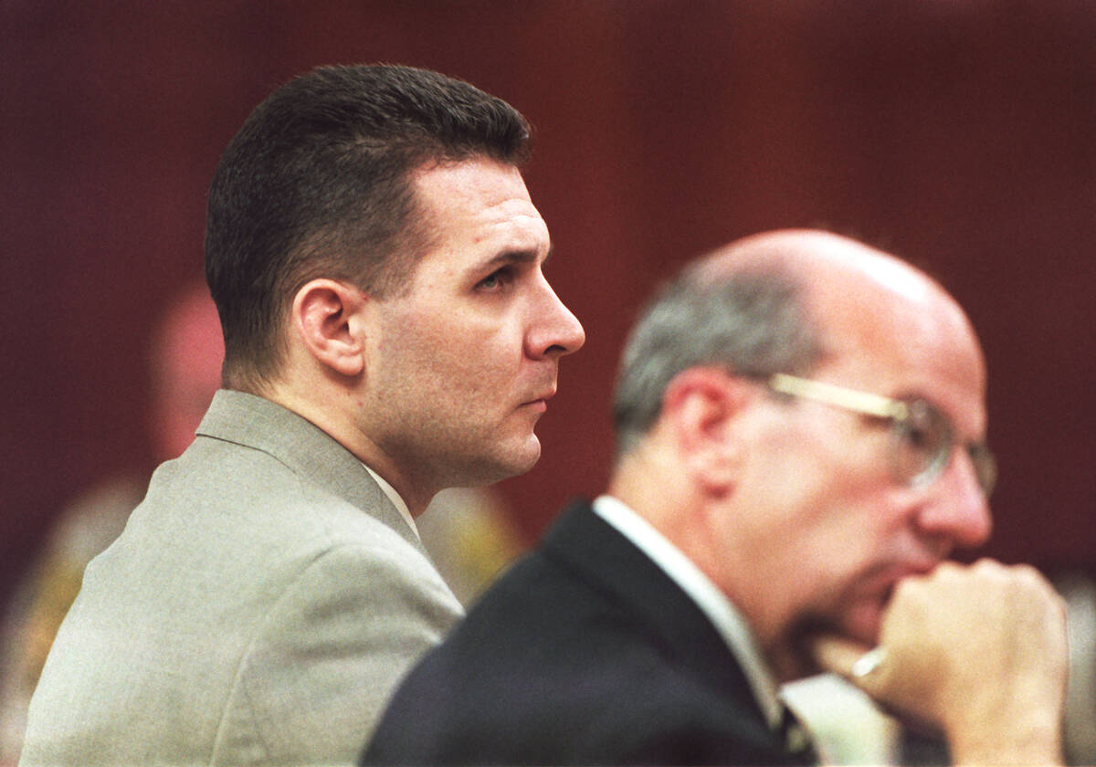Ronald Mortensen and his attorney, Frank Cremen, look at jurors as they are polled following th ...