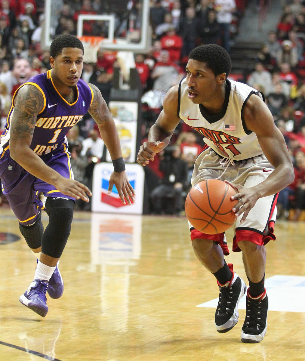 UNLV's Justin Hawkins drives past Northern Iowa's Deon Mitchell during a game at the Thomas & M ...
