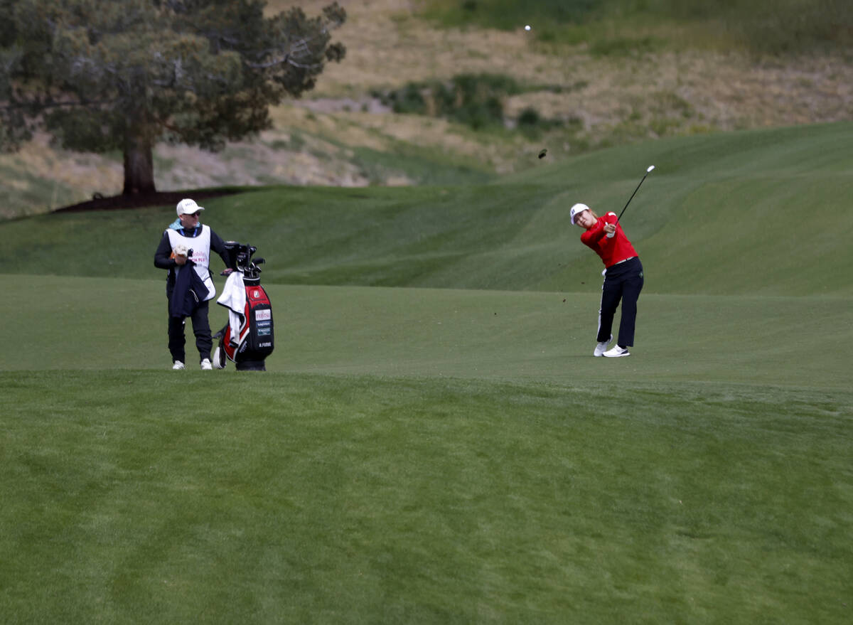 Ayaka Furue of Japan shots from the fairway during the first round of the LPGA T-Mobile Match P ...
