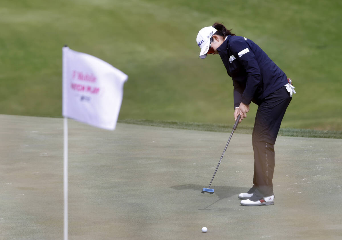 A Lim Kim of Korea watches her put to the 2nd hole during the first round of the LPGA T-Mobile ...