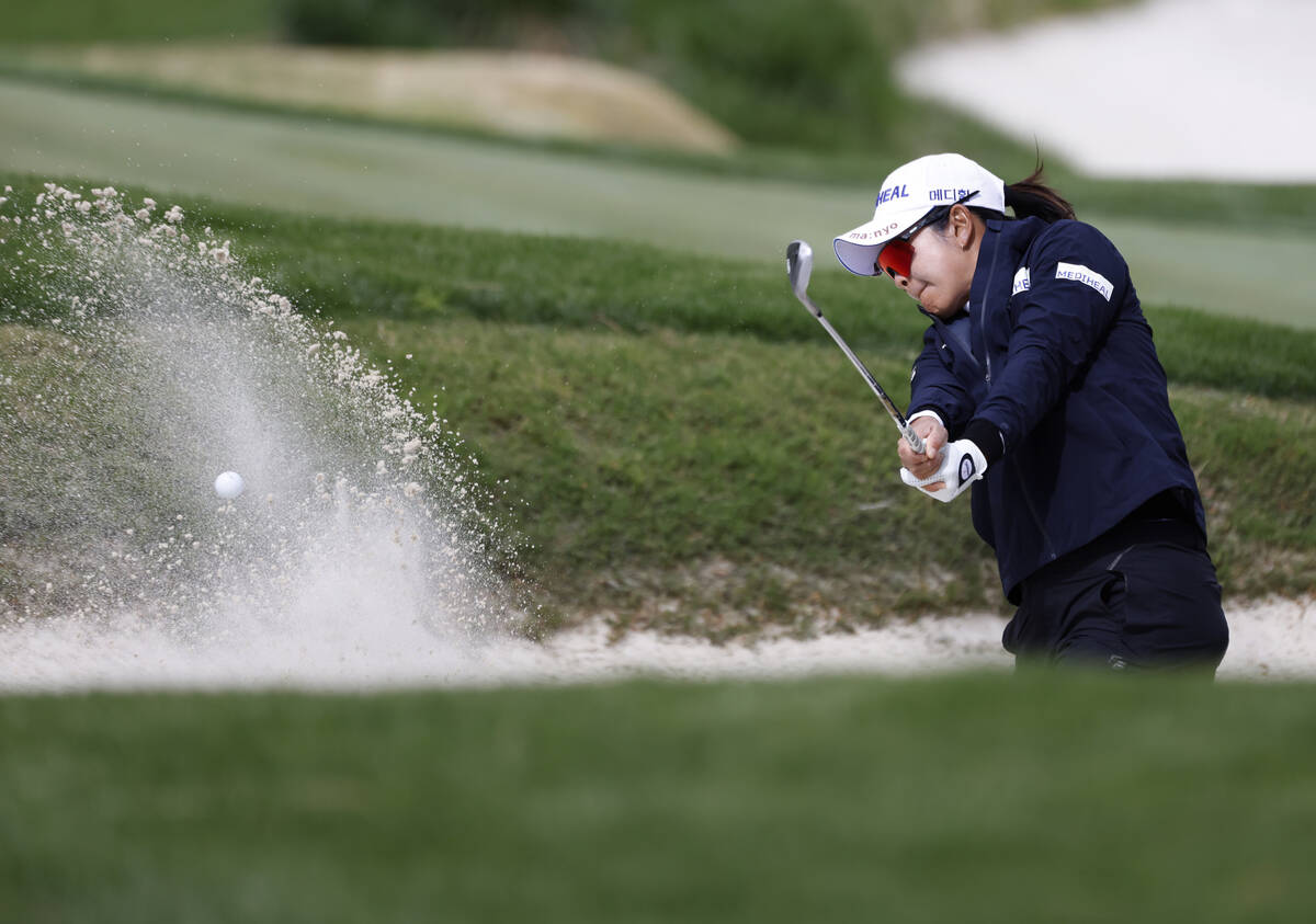 A Lim Kim of Korea hits out of the sand to the second green during the first round of the LPGA ...