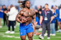 Boise State's Ashton Jeanty runs a drill during the school’s NFL football pro day held, ...