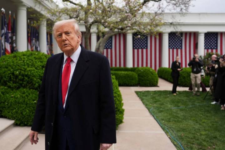 President Donald Trump departs after signing an executive order at an event to announce new tar ...