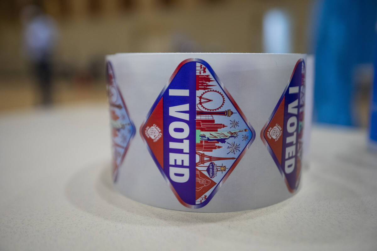 Stickers are seen at the Historic Fifth Street School polling station in Las Vegas on Tuesday, ...