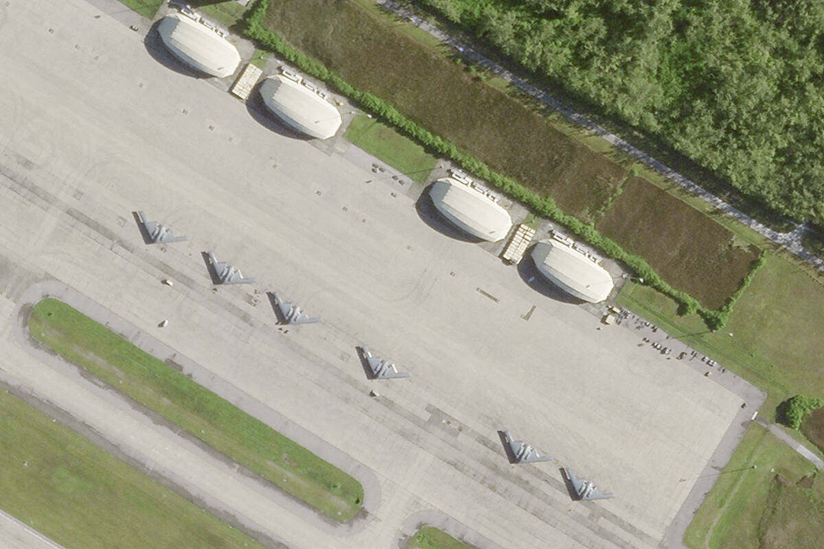 This satellite photo from Planet Labs PBC shows six B-2 stealth bombers parked at Camp Thunder ...