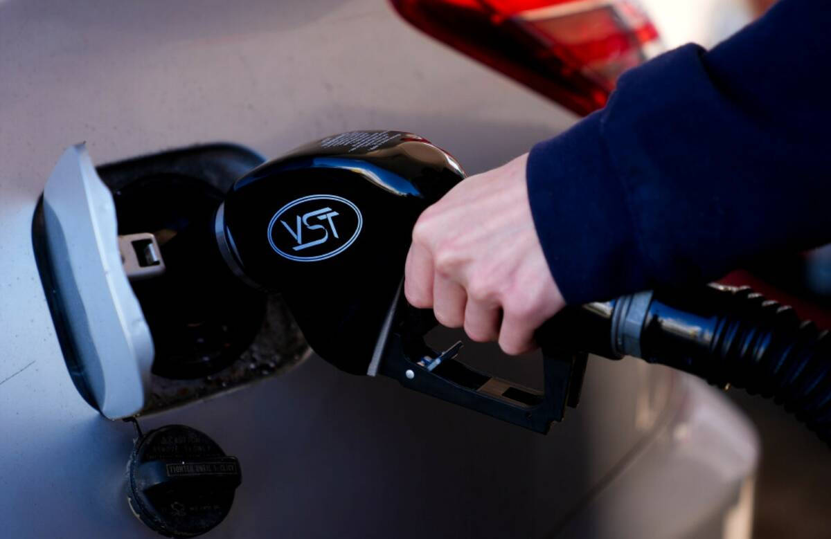 A driver fills up at a gasoline pump at a Shell gas station, Oct. 9, 2024, in Seattle. (AP Phot ...